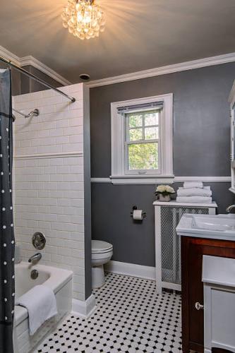 Interior of modern small master bathroom in private city  residence.