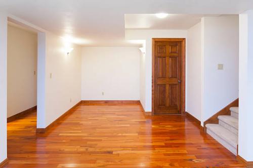 New Home Finished Basement with Hardwood Flooring